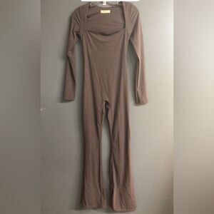 68. Quinsen flare jumpsuit size small